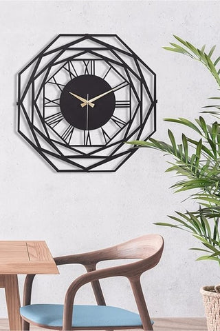 Black hexagon wall clock with metal niddle
