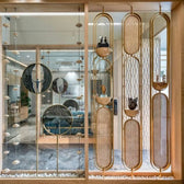 Stylish Gold & Wood Partition with Decorative Elements - gold-finished metal furniture for living room | Kraft Vision