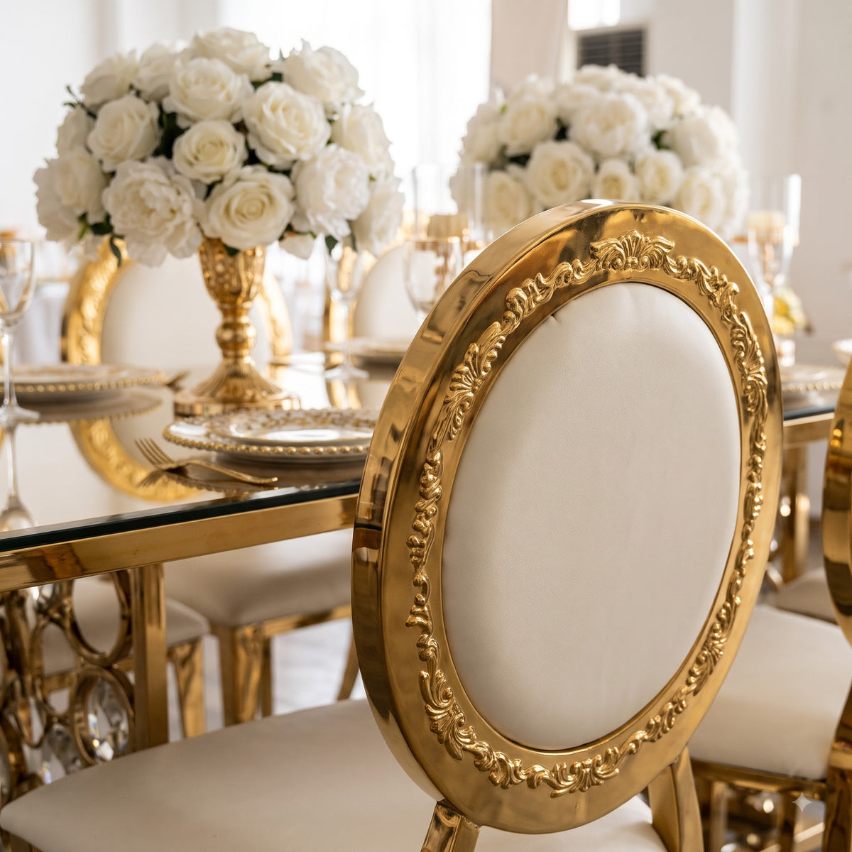 Luxury Gold and White Dining Table Set with Elegant Oval Back Chairs, Mirrored Glass Tabletop, Ornate Metallic Base, and Beautiful White Rose Centerpiece for Modern Royal Dining Room Interior Decor