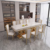 Luxury White Marble Dining Table with Sculptural Gold Metal Base and Matching Chairs