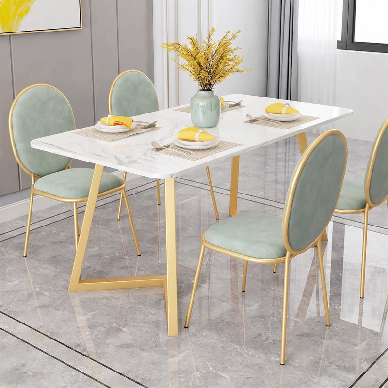 Luxury White Marble Dining Table with Gold Geometric Legs and Sage Green Chairs