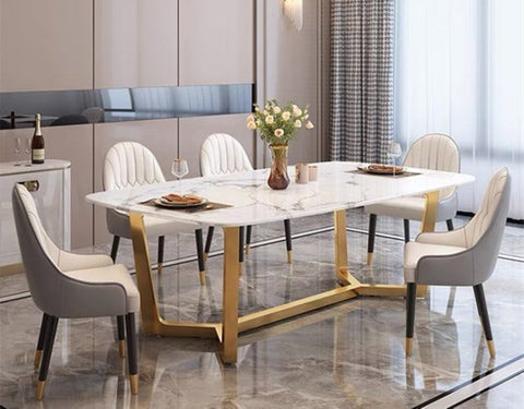 gold plated dining set with white marble top