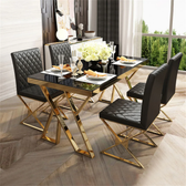 Modern Black Glass Dining Table with Gold X-Base & Quilted Leather Chairs (6-Seater) - gold-finished metal dining table for dining room - view 2 | Kraft Vision