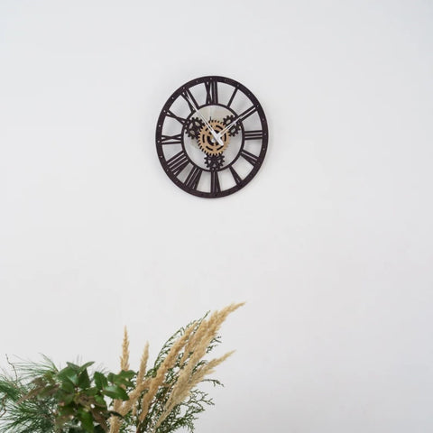 Black  wall clock with designer middle work